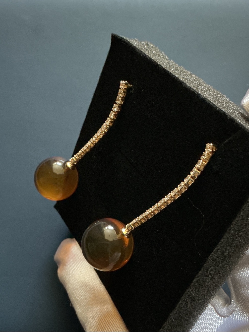Elegant Gold Drop Earrings with Amber Spheres